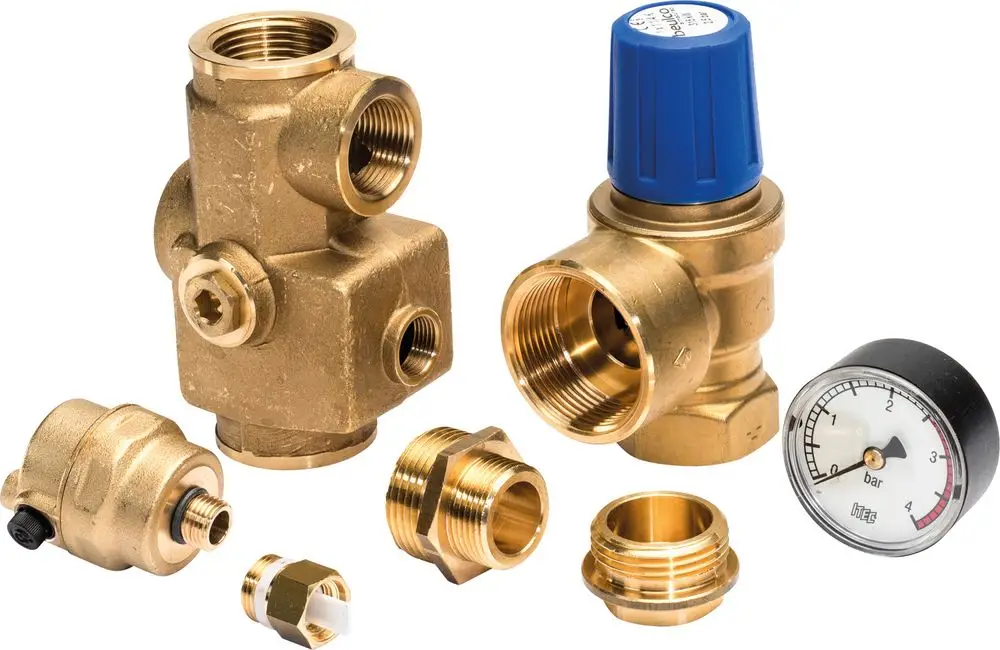 Zubehörset für Heizungsanwendungen, bestehend aus verschiedenen Ventilen und einem Manometer. Teil der Komponenten sind typisch für Bosch Produkte in Heizsystemen.